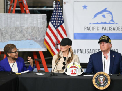 S First Lady Melania Trump and US President Donald Trump look on as Los Angeles Mayor Kare