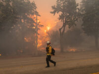 Homes Burn as Wildfire Is Carried Across Pacific Palisades by Strong Winds