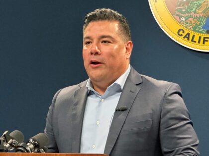 FILE - California Insurance Commissioner Ricardo Lara speaks during a news conference in a