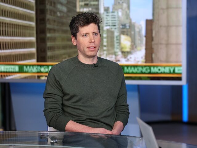 Sam Altman on a TV set