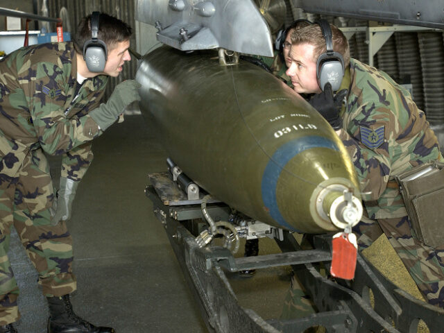 Tech. Sgt. Sean Hughes (R) And Airman 1St Class Jerry Pierson Secure A Mk 84C, A 2,000-Pou