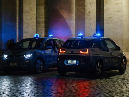 Italian police cars parked next to each other, Unsplash