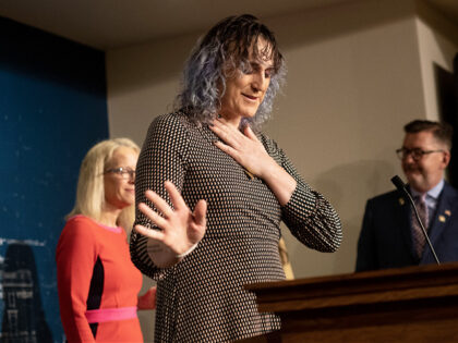 Minnesota State Representative Leigh Finke (C) pauses while speaking about the Trans Refug