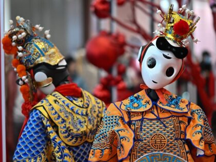 Robots are seen during the Spring Festival Science and Technology Temple Fair in Beijing o