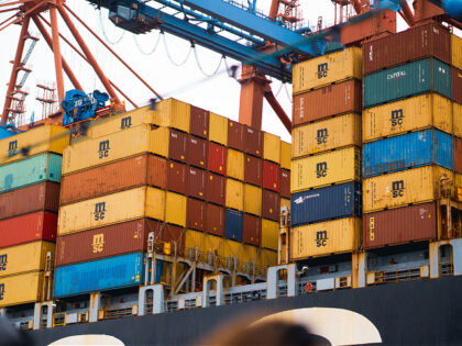 a large cargo ship loaded with lots of containers