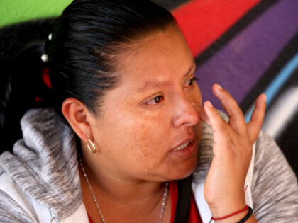 A woman from Mexico, weep as she tells her story at Albergue Del Desierto on Wednesday, Ma