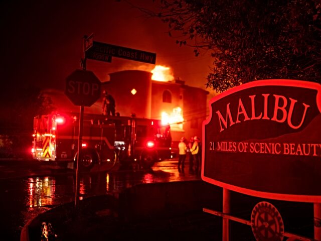 Pacific Palisades, CA - January 07:Firefighters battle winds and flames as multiple beachf