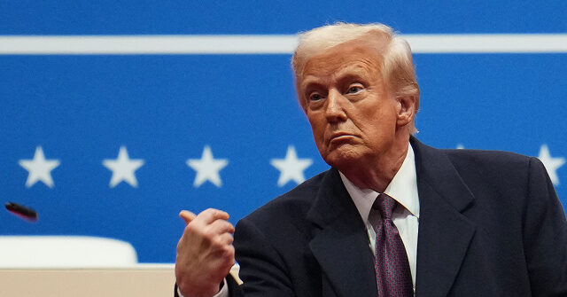 Trump Tosses Pens to Crowd After Signing Executive Orders