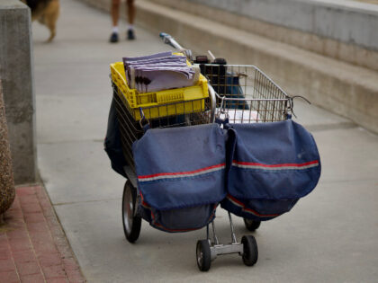 mail carrier's cart on sidewalk