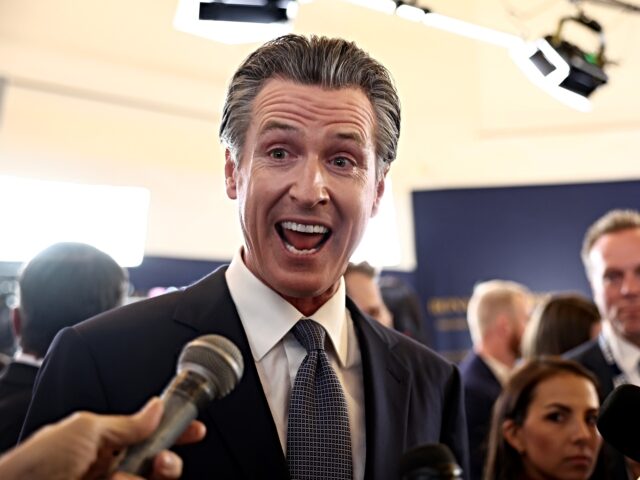 SIMI VALLEY, CALIFORNIA - SEPTEMBER 27: California Gov. Gavin Newsom talks to reporters in