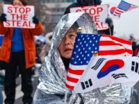 Thousands of Conservatives Rally for Impeached President in South Korea, Waving U.S. Flags