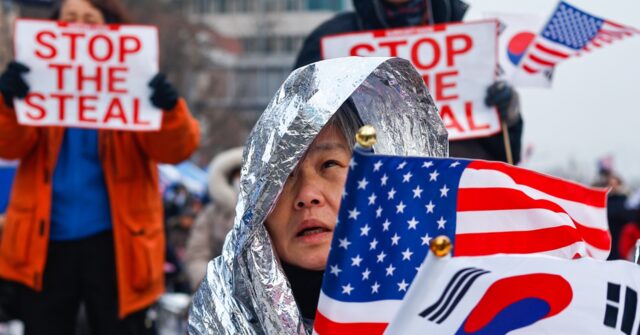 Thousands of Conservatives Rally for Impeached President in South Korea, Waving U.S. Flags