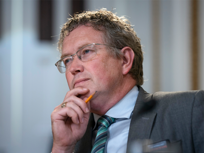 FILE - Rep. Thomas Massie, R-Ky., listens as the House Rules Committee prepares a bill at