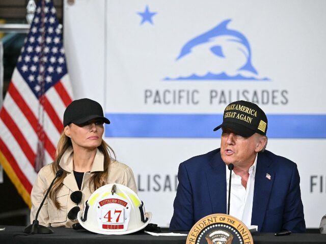 US First Lady Melania Trump listen to US President Donald Trump speak during a fire emerge