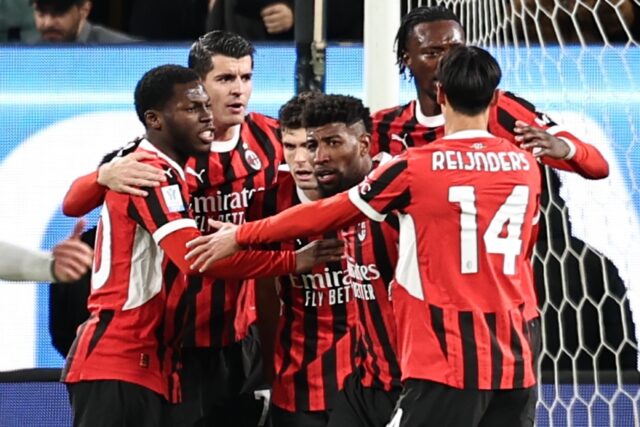 AC Milan players celebrate Christian Pulisic's equaliser against Juventus in a 2-1 win ove