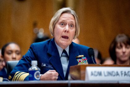 Admiral Linda Fagan, pictured speaking during a Senate hearing in June 2024, has been repl