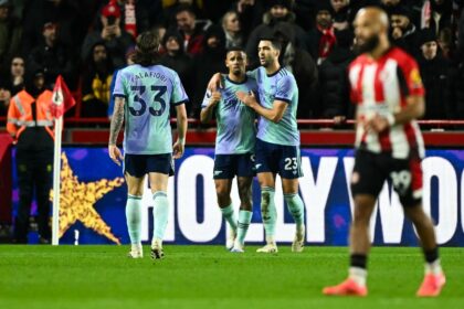 Arsenal's Gabriel Jesus (C) celebrates after scoring against Brentford