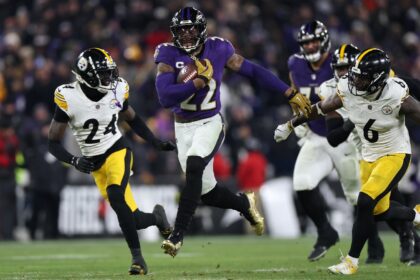 Baltimore's Derrick Henry runs for a touchdown in the Ravens' NFL playoff victory over the