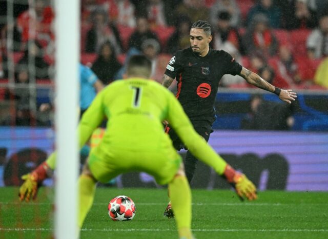 Barcelona's Brazilian forward Raphinha struck a late winner against Benfica