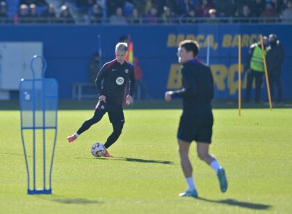 Barcelona midfielder Dani Olmo (L) is in an uncertain situation with the club not yet regi