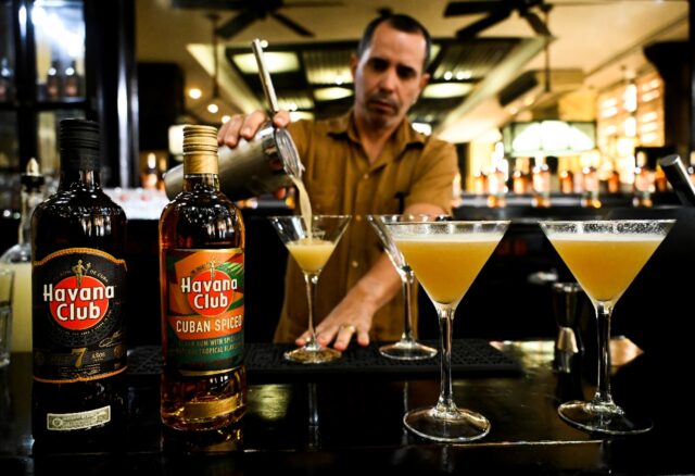 A bartender prepares a cocktail with the new Havana Club Cuban Spiced rum at Havana's rum