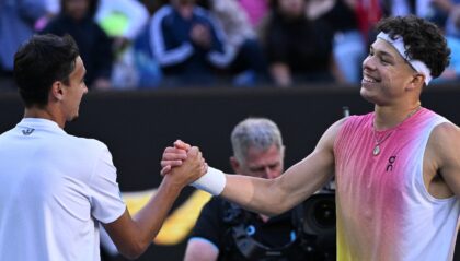 Ben Shelton (right) greets Lorenzo Sonego after his victory