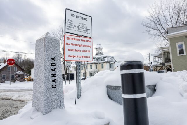 A border post marks the boundary between Derby Line in the US state of Vermont and its twi
