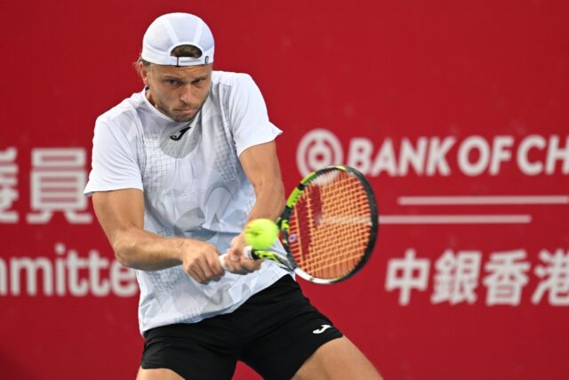 France's Alexandre Muller hits a return to Japan's Kei Nishikori during the final of the H