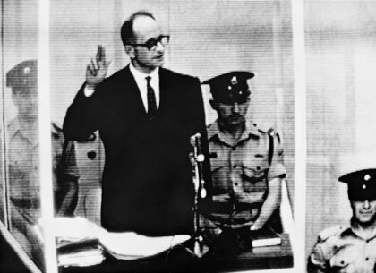 Nazi leader and war criminal Adolf Eichmann takes oath during his trial before an Israeli