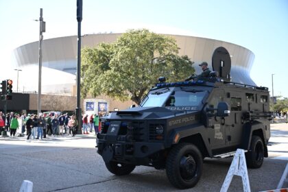 Members of a Louisiana State Police SWAT team stand guard outside of the Superdome ahead o