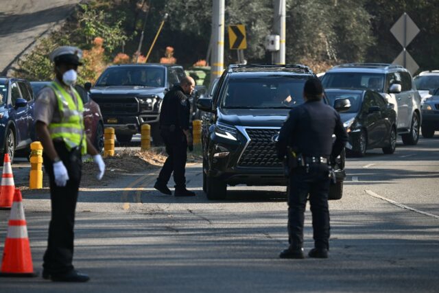 Police are setting up checkpoints to control who goes in and out of areas affected by the