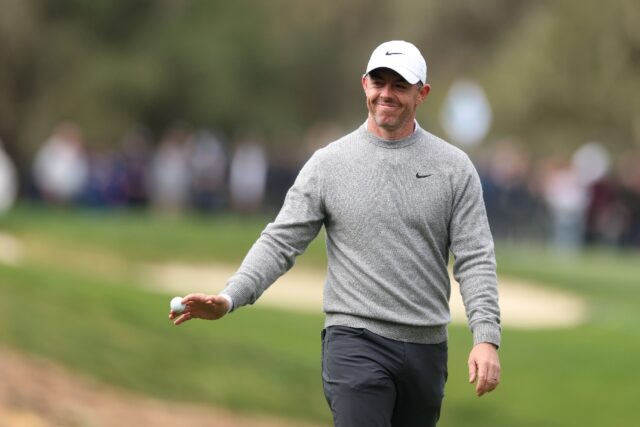 Rory McIlroy acknowledges the crowd after his opening round hole-in-one at the PGA Tour's