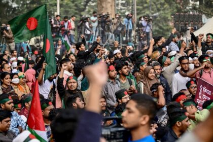 Students and supporters shout slogans during a 'March for Unity' organised by the Anti-Dis