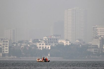 Thick smog blankets Hanoi, obscuring buildings and leaving nine million residents choking