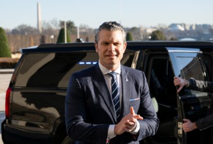 US Secretary of Defense Pete Hegseth speaks with the media in front of the Pentagon on Jan