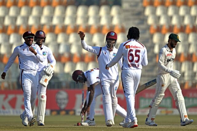 West Indies' players celebrate the dismissal of Pakistan's Kashif Ali