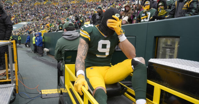 Packers WR Christian Watson carted into locker room. QB Jordan Love ...