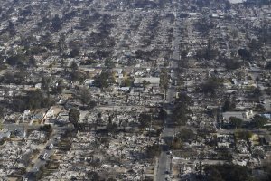 Southern California faces strong winds, dangerous conditions as fires persist