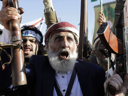 A Houthi supporter shouts slogans during during an anti-U.S and Israel rally in Sanaa, Yem