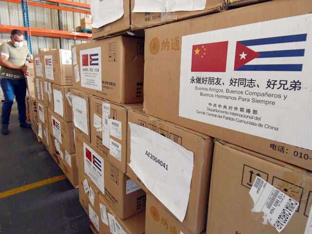 Cuba and China 1 A staff member transports medical supplies donated by the International Department of the