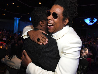 BEVERLY HILLS, CALIFORNIA - JANUARY 25: (L-R) Sean 'Diddy' Combs and Jay-Z atten