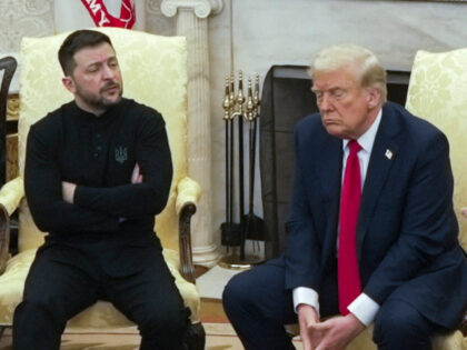 Vice President JD Vance, right, (not pictured) speaks with Ukrainian President Volodymyr Z