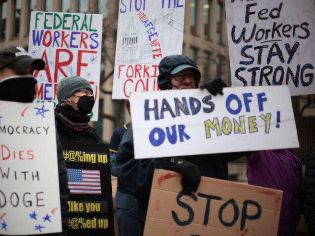 WASHINGTON, DC - FEBRUARY 05: Protesters rally outside of the Theodore Roosevelt Federal B