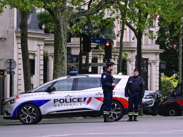 French police officers take part in a security perimiter near the consulate of Iran in Par