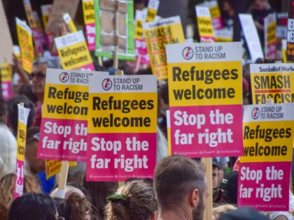 LONDON, UNITED KINGDOM - 2024/08/10: Protesters hold 'Refugees welcome, stop the far right