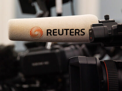 Reuters microphone is seen during a joint press conference with Prime Minister Mette Frede