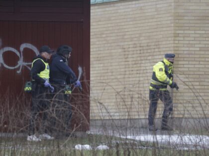 Police officers are seen at the Risbergska School in Orebro, Sweden, on February 4, 2025,