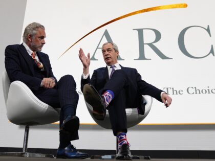 Reform UK leader Nigel Farage (right) is interviewed by Jordan Peterson during the Allianc