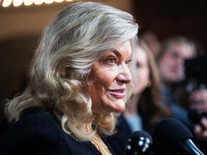 Sen. Cynthia Lummis, R-Wyo., talks with reporters in Russell building before a vote on Thu