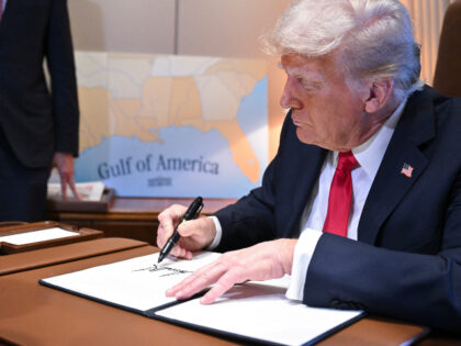 U.S. President Donald Trump signs a proclamation renaming the Gulf of Mexico as the Gulf o